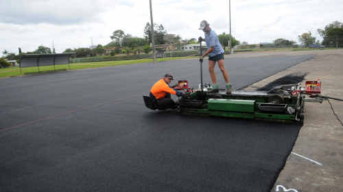 Sports Technology International workers lay the shock pad for the new artificial hockey surface yesterday. Sports Technology International workers lay the shock pad for the new artificial hockey surface yesterday.